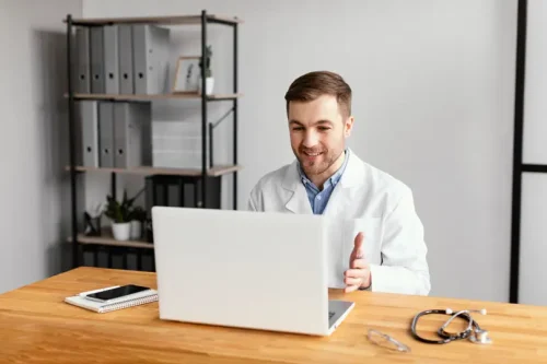 medium-shot-doctor-working-with-laptop.webp medium-shot-doctor-working-with-laptop.webp